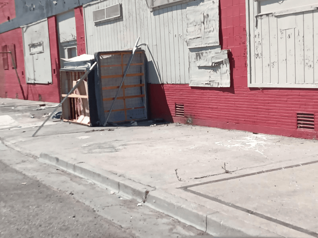 29c25e4d-0ab4-48d0-a21c-c7a1acb52d9a An image of a makeshift shelter, made with bed mattresses