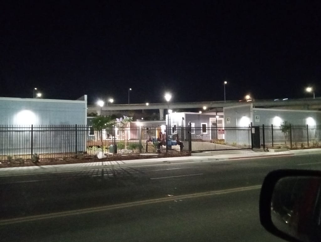 People waiting outside the unopened Lincoln Street Shelter in Stockton